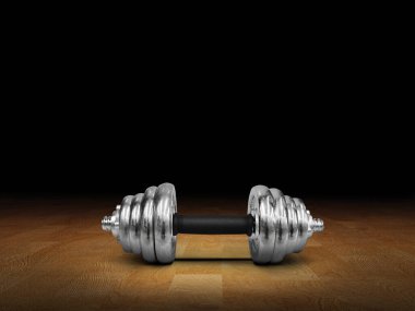 Ahşap zemine yerleştirilmiş gümüş halterler, siyah arka plan..