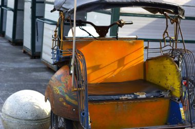 Becak, traditional vehicle in Malioboro street Yogyakarta clipart