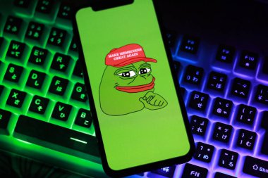 Indonesia - March 17th, 2024: Pepe cryptocurrency PEPE Token, Cryptocurrency logo on dark background RGB keyboard. clipart