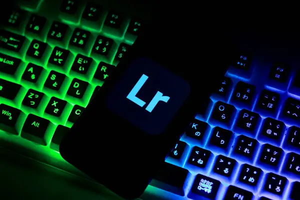 stock image Indonesia - April 16th 2024: Logo of Adobe Lightroom is displayed on a smartphone screen