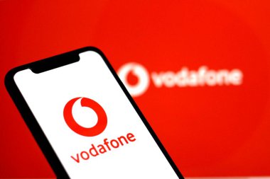 In this photo illustration, the Vodafone logo is displayed on a smartphone screen stock image.Indonesia - May 25Th 2024. clipart