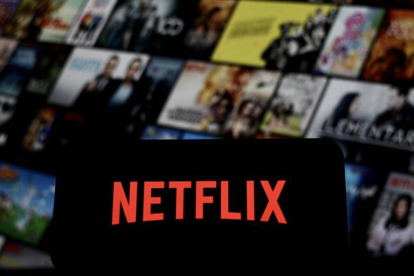 In this photo illustration, the Netflix logo is displayed on a smartphone screen stock image.Indonesia - May 25Th 2024.