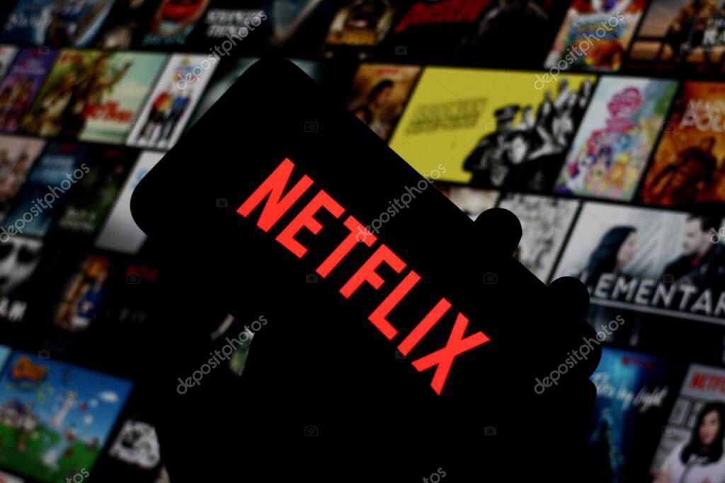 In this photo illustration, the Netflix logo is displayed on a smartphone screen stock image.Indonesia - May 25Th 2024.