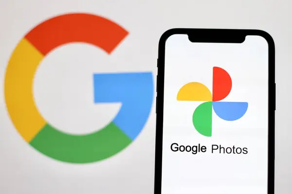 stock image The logo of Google photos,is displayed on smartphone.indonesia - June 16th 2024.