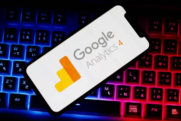 stock image In this photo illustration,the logo of Google Analytics 4,is displayed on a smartphone.indonesia - June 26th 2024.