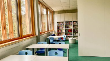 Schwabisch Gmund, Germany-November 12,2022: School library in a German school. High quality photo clipart