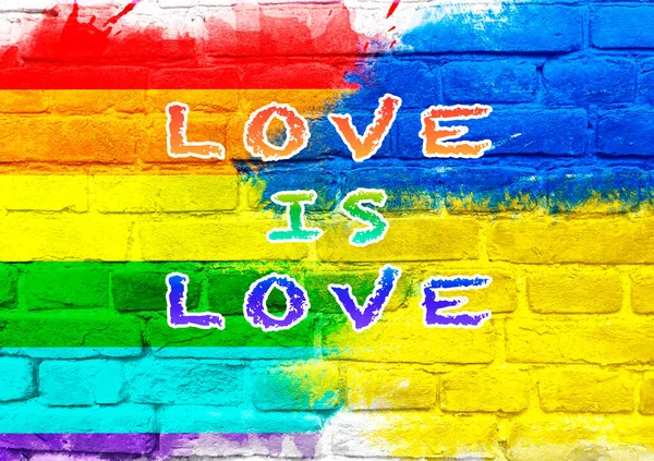 愛とレンガの背景に水平ストライプとウクライナのフラグを持つLgbtの虹のフラグは 愛のテキストです ウクライナにおけるLgbtの平等権の概念 — ストック写真