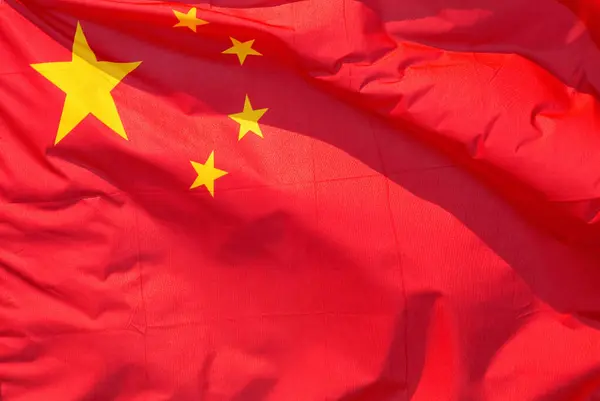 National flag of China waving in the wind, close-up