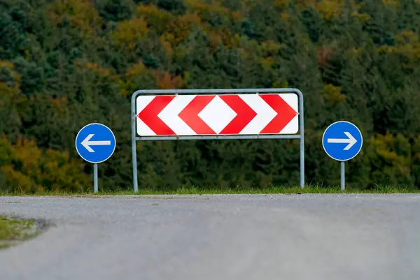 Germany, fork in the road with the possibility to go left or right