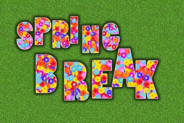 Yeşil yonca arka planında renkli çiçeklerle yazılmış bahar tatili