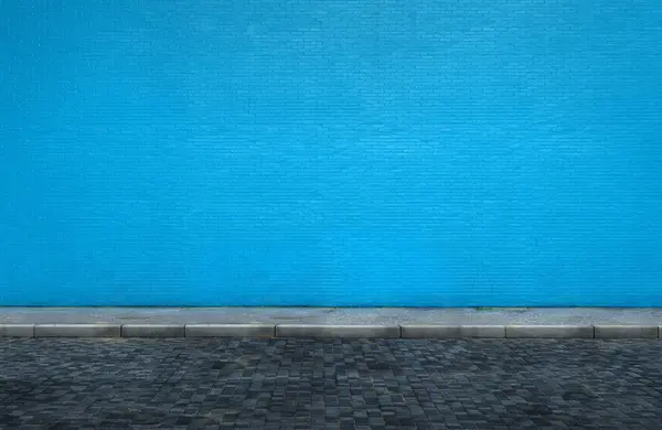Grote Blauwe Bakstenen Muur Straat Met Stoep Rechtenvrije Stockfoto's