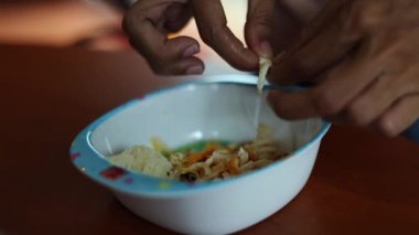 BBQ Shredded Chicken With Sticky Rice For Kid, Footage for food films and cinematic in family dinner scene. Also good background for scene and titles.