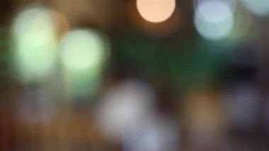 Abstract blurred coffee shop with chair and wood table interior restaurant vintage background. Blur Background With Bokeh Of Restaurant.