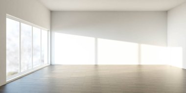 Geniş pencereli boş bir oda geniş doğal ışığın parke zemini aydınlatmasını sağlıyor..