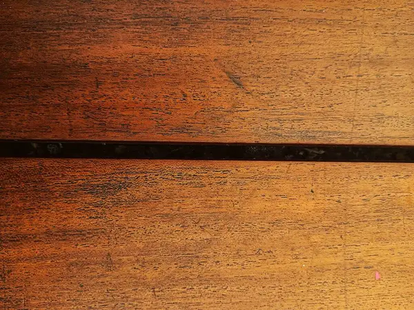 Arka plan olarak kahverengi ahşap bankların üst görüntüsü. Kopya alanı için yüzey konsepti fotoğrafı.