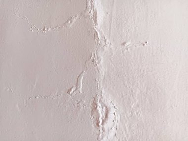 Boya kabarcıklarının soyut dokusu ya da beyaz bir duvardaki kabarcıklar.