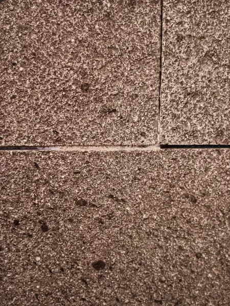 Arka plan olarak doğal taş duvar kaplamasının soyut dokusu.