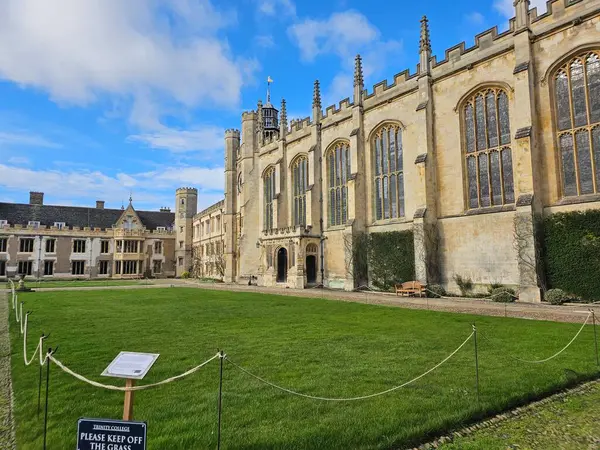 Cambridge, England. The courtyard of Trinity College. Academic buildings, administrative buildings and Trinity College Fountain and Chapel.