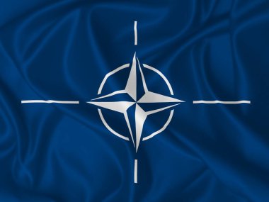 NATO bayrağı kumaş dokusunda rüzgarda dalgalanıyor