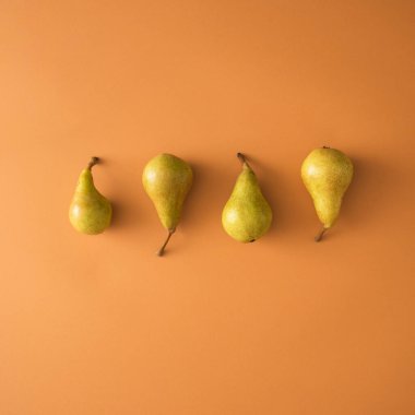 Pastel arka planda taze organik meyvelerin yaratıcı konsepti, minimum düzlük .