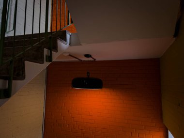 turuncu duvar ve yeşil lamba eski bir binada asılı.