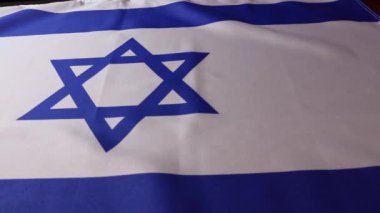 İsrail ulusal bayrağının sürgülü görüntüsü. Yüksek kalite 4k görüntü