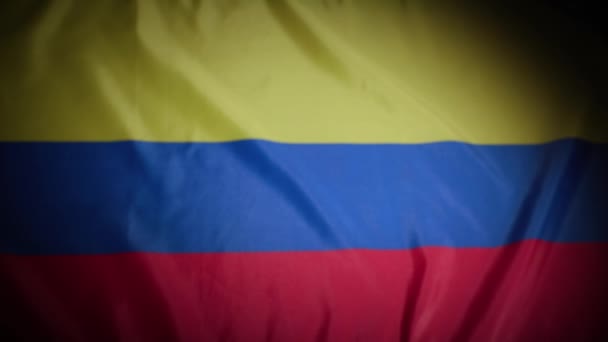 ビネットでコロンビアの国旗のラックフォーカス 高品質の4K映像 — ストック動画