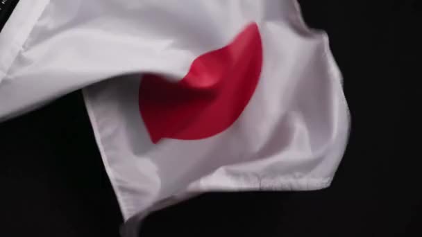 Japán Nemzeti Zászló Sötét Háttérrel Kiváló Minőségű Felvételek — Stock videók