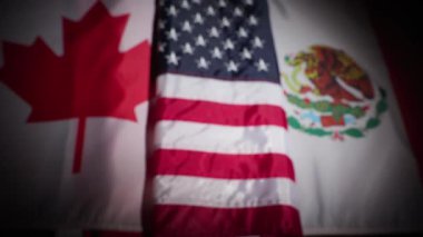 Kanada, Birleşik Devletler ve Meksika ulusal bayraklarının odak noktası. Yüksek kalite 4k görüntü