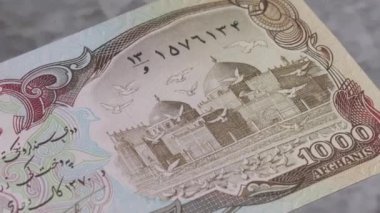 1000 Afgan ulusal para birimi yasal ihale banknotu 3 'ü kapattı. Yüksek kalite 4k görüntü