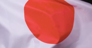 Japonya ulusal bayrağı dalgalanan rüzgar yavaş çekimde. Yüksek kalite 4k görüntü