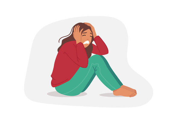 Расстроенная женщина плачет, сидит на полу и сжимает голову, из-за панической атаки или личного выгорания. Расстроенная девушка испытывает стресс и депрессию из-за конфликта с парнем.