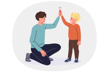 Baba, annesinden boşandıktan sonra beşlik çakan bir çocuktan ve tek başına büyüten bir çocuktan küçük oğlunu destekliyor. Genç bekar baba oğluyla iletişim kurarken gülümsüyor. Babalar gününü kutluyor.