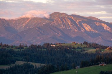 Summer Landscape Of Poland Tatra Mountains. Beautiful View Of High Tatras And Picturesque Sunny Valley. Polish Rural Landscape With Tatry Mountain At Sunrise.
