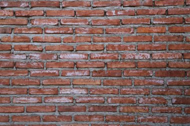 Brick Wall Arkaplanı. Kırmızı kil tuğla duvar. Kırmızı tuğla duvar dokusu. Graffiti ve sanat için kırsal bir arka plan.