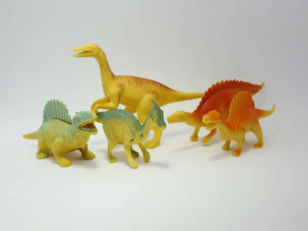 Group of toy dinosaurs. Plastic dinosaurs. Toys for young children. Jurassic time
