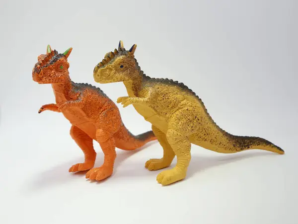 Pair of dinosaurs. Toy dinosaurs for children. Plastic toys.