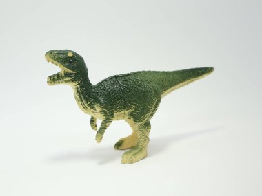 Tyrannosaurus rex. Toy dinosaurs for children. Plastic toys. clipart