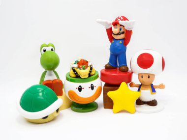 Super Mario Bros. MacDonal's Happy Meal Toys. Toad. Super Mario Bros and friends. Super famous video game. Isolated. Star. Box. Video game characters. Nintendo. Yoshi, Toad, Bowser Jr, Bowsy, star. clipart
