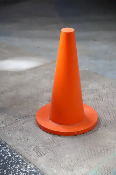 Orange signaling cone. I know road safety. Industrial Security. Sign. Icon. Protection. Watch out. Signaling.