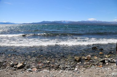 Panoramic view of Lake Nahuel Huapi on the shores of the city of Bariloche, Ro Negro, Argentina. Argentine Patagonia. Patagonian lake. Touristic city. Puerto San Carlos. clipart
