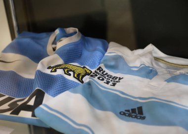 Exhibition of rugby shirts at the Kempes Sports Museum, Crdoba, Argentina. T-shirt of the Argentine rugby team of the Los Pumas team. clipart