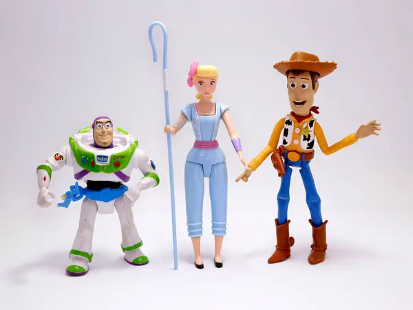 stock image Toy Story movie. Woody, Bo Peep and Buzz Lightyear. Pixar and Disney movie toys. Cowboy, shepherd and astronaut. Porcelain doll of a night lamp. . I will be your faithful friend. Isolated white.