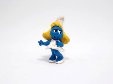 Smurfette. The smurfs. Girl smurf. Little blue creatures that live in mushroom houses in the woods. Television characters, movies and comics. Blue creatures. clipart