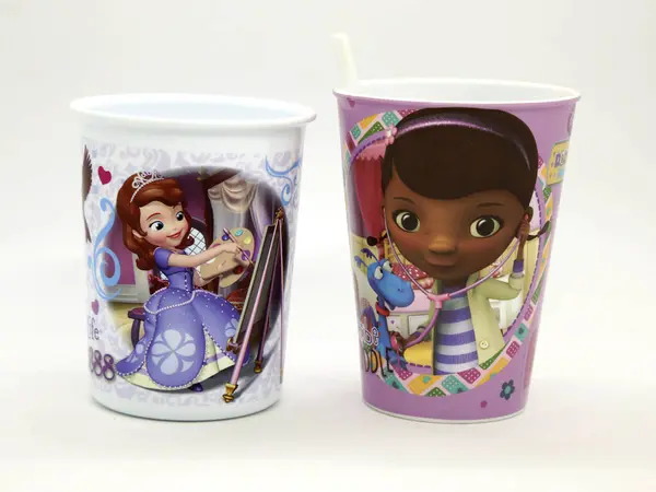 stock image Sofia the First and Doc McStuffins glasses Objects with the design of Disney Junior characters for children. Toys for children. Isolated. Girls. Princess.