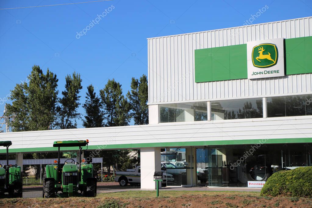 Facade of John Deere business selling agricultural machinery. Business selling tractors and machinery for the field.