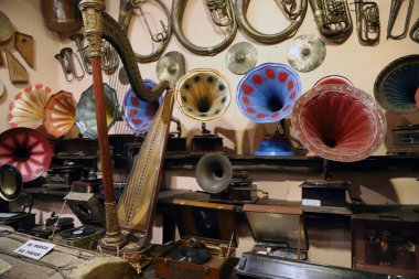 Collection of antique gramophones and musical instruments exhibited at the Rocsen Museum, Crdoba, Argentina clipart