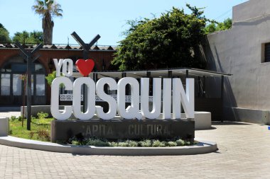 Poster in giant three-dimensional letters I love Cosqun, Cultural Capital of Folklore. Crdoba, Argentina. clipart