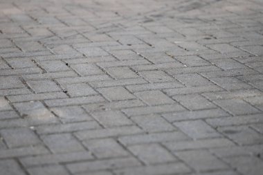 Birbirine kenetlenmiş kaldırım taşları. Beton tuğla deseni. Arkaplan.