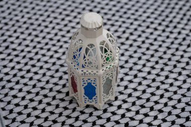 palestine keffiyeh with ramadan lantern on isolated background clipart
